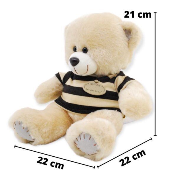 oso de peluche beige playera negra 2