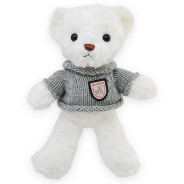 oso de peluche blanco sueter gris