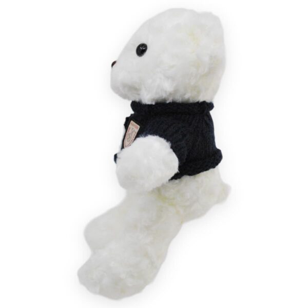 oso de peluche blanco sueter negro 4