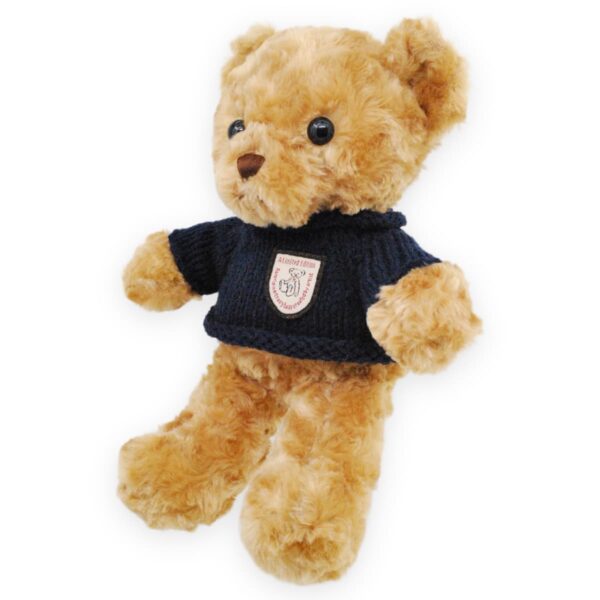 oso de peluche café sueter negro 3