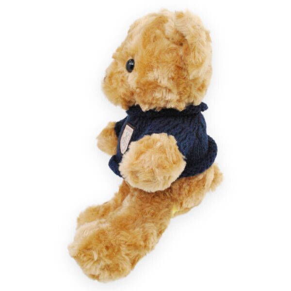 oso de peluche café sueter negro 4