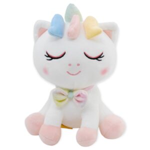 unicornio de peluche blanco con cuerno verde